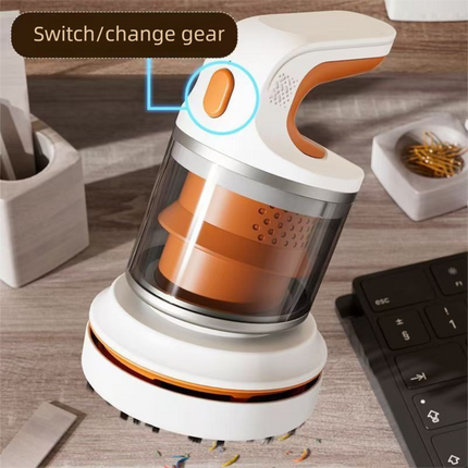 Orange Compact Desktop Vacuum Cleaner – Cordless Handheld Dust Remover for Office, Keyboard, Car & Home Use with Dual Suction Modes and USB Charging.