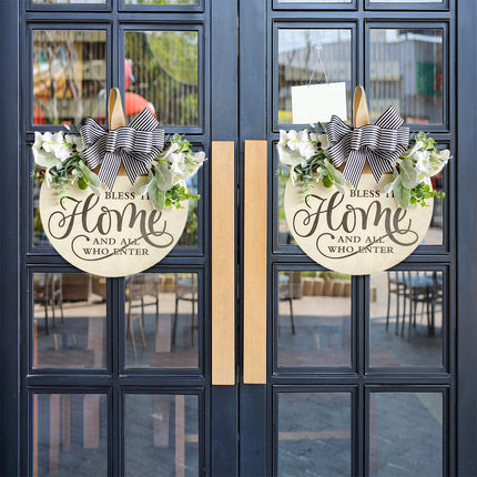 Rustic Wooden Door Hanger – "Bless This Home and All Who Enter" Round Sign with Artificial Flowers & Striped Bow for Front Door, Porch, or Entryway Decor.