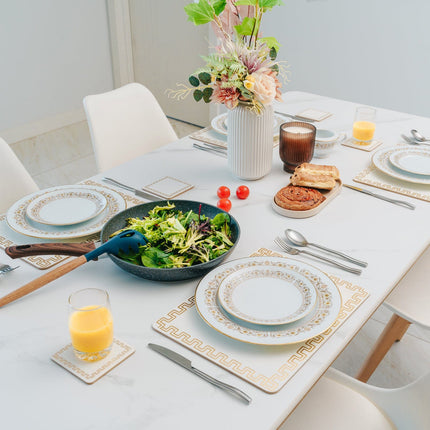 Clevinger Set of 4 MD Placemats Gold Border.