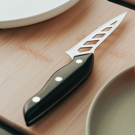The Versatile Wonder Knife Chef Knife Standless Stell Blade Stay Smooth & Sharp.