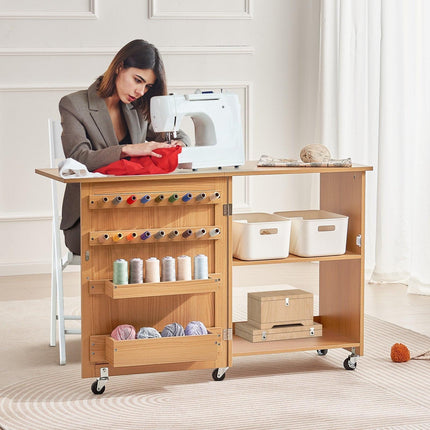 Folding Sewing Table with Lockable Wheels Shelves Trays Door Wood Color.