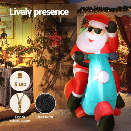 Jingle Jollys Christmas Inflatable Santa Motorbike LED Illuminated Decorations.